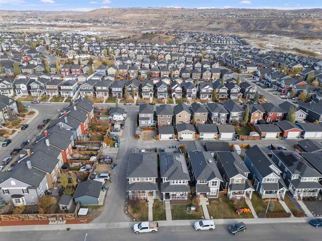 MLS® A2266090 - 411 River Heights Crescent  in River Song Cochrane, Residential