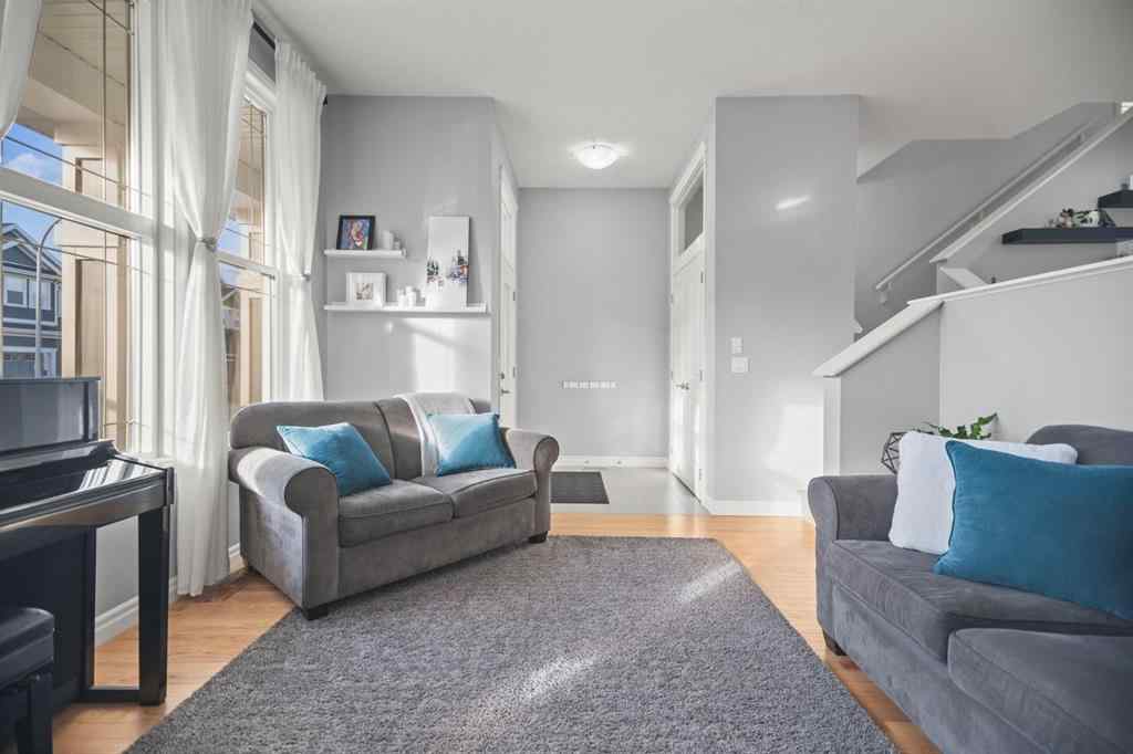 MLS® A2266090 - 411 River Heights Crescent  in River Song Cochrane, Residential