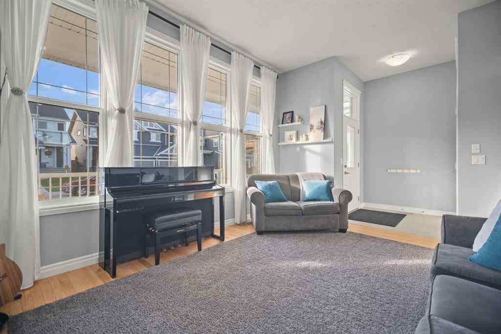 MLS® A2266090 - 411 River Heights Crescent  in River Song Cochrane, Residential