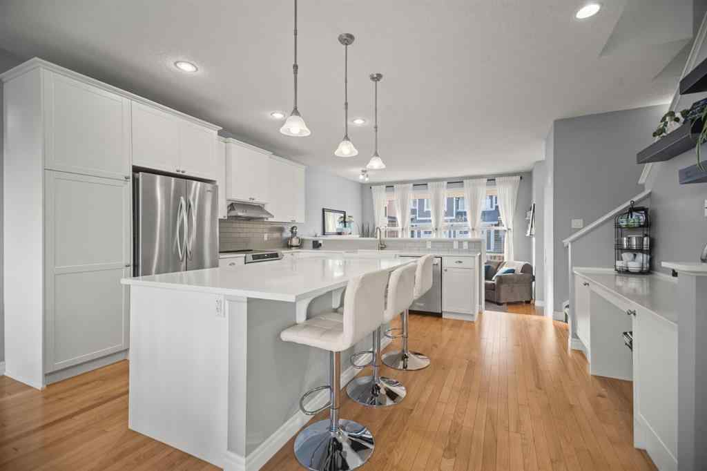 MLS® A2266090 - 411 River Heights Crescent  in River Song Cochrane, Residential