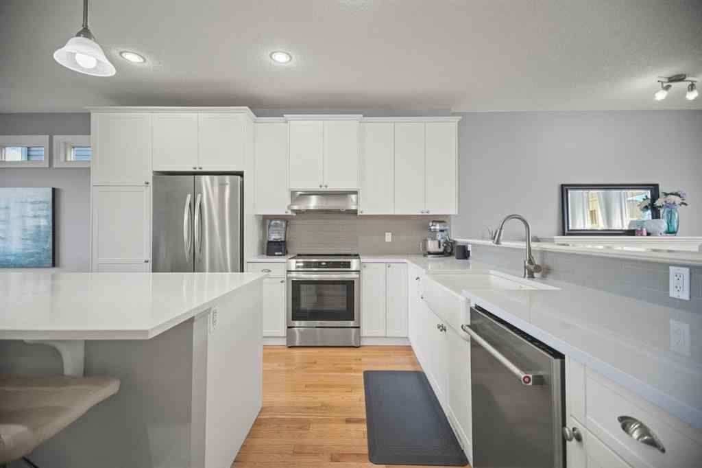 MLS® A2266090 - 411 River Heights Crescent  in River Song Cochrane, Residential