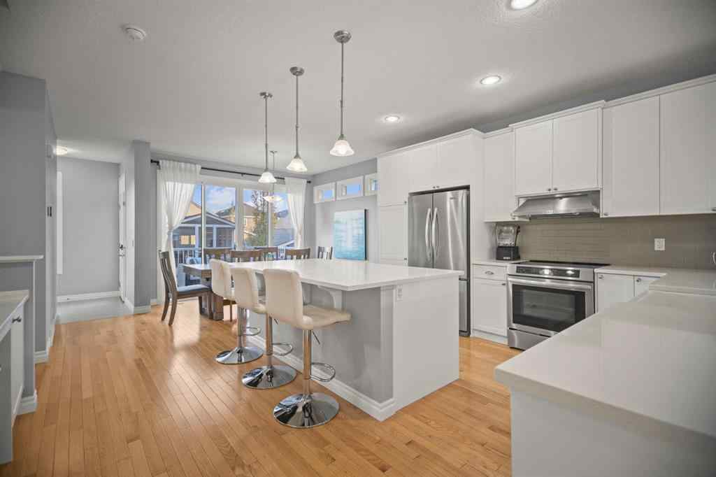 MLS® A2266090 - 411 River Heights Crescent  in River Song Cochrane, Residential