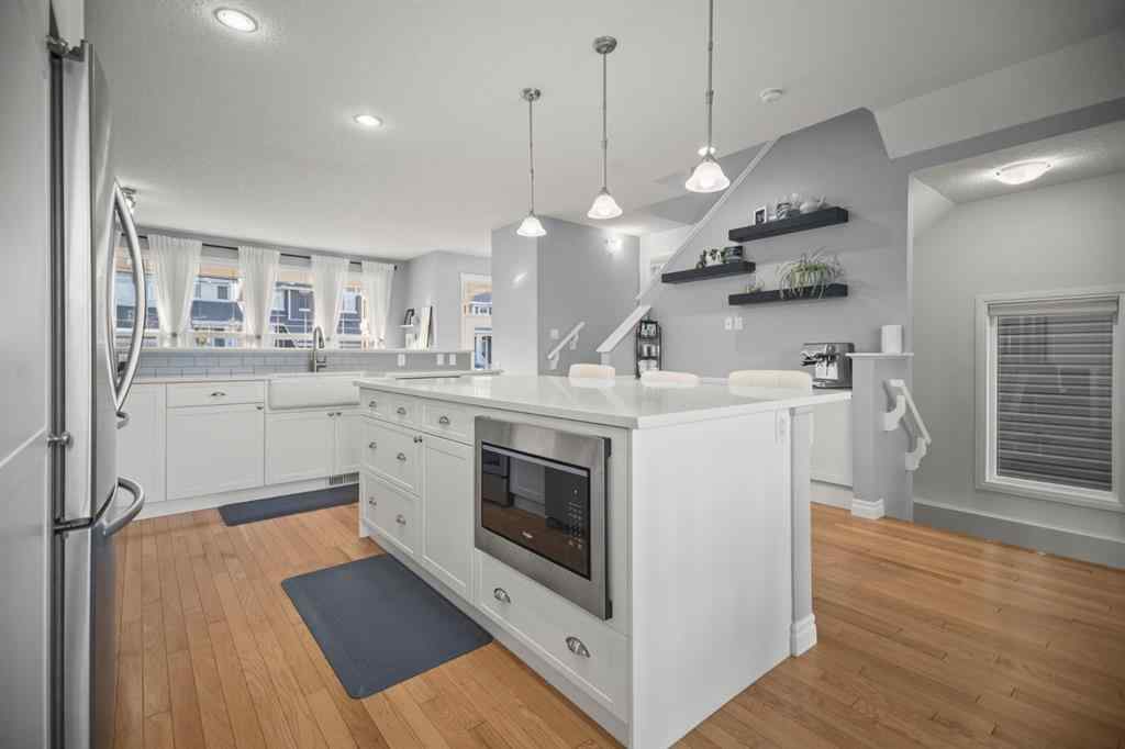 MLS® A2266090 - 411 River Heights Crescent  in River Song Cochrane, Residential