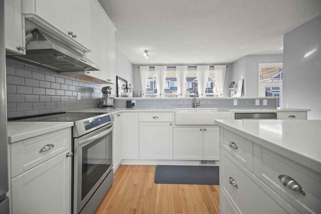 MLS® A2266090 - 411 River Heights Crescent  in River Song Cochrane, Residential