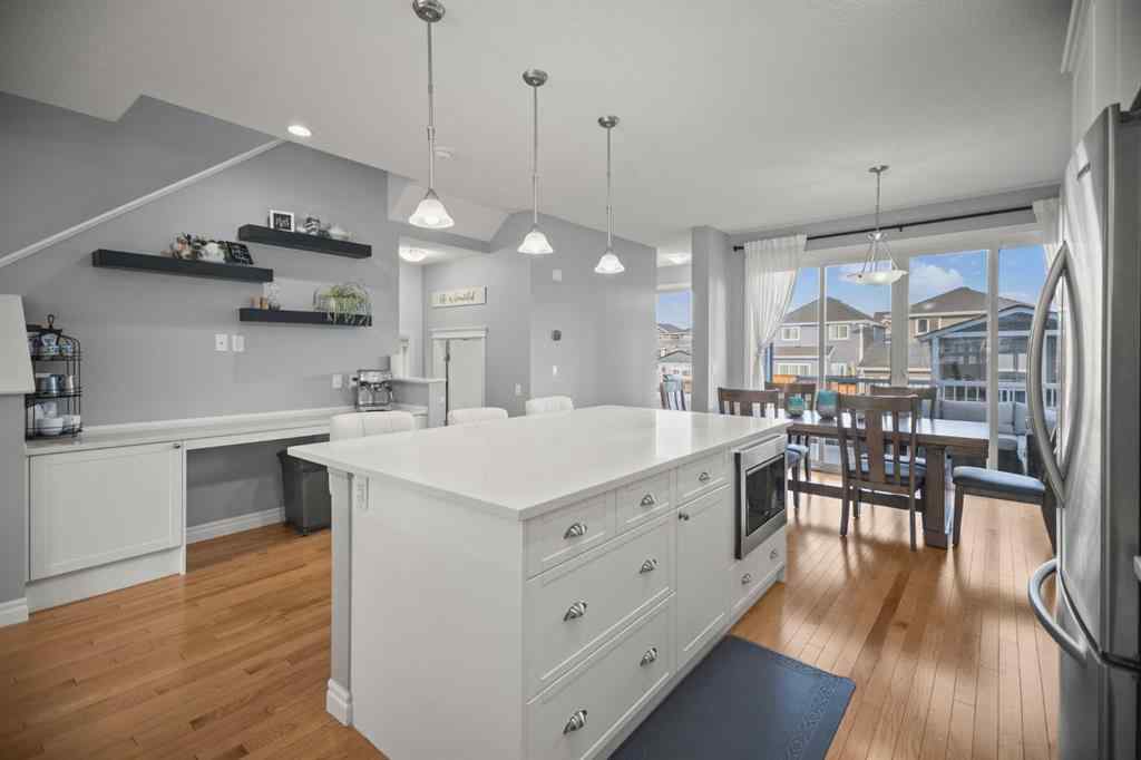 MLS® A2266090 - 411 River Heights Crescent  in River Song Cochrane, Residential