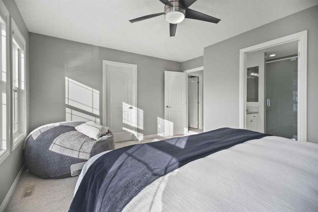 MLS® A2266090 - 411 River Heights Crescent  in River Song Cochrane, Residential