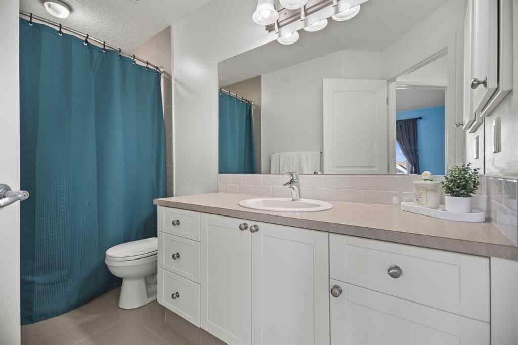 MLS® A2266090 - 411 River Heights Crescent  in River Song Cochrane, Residential