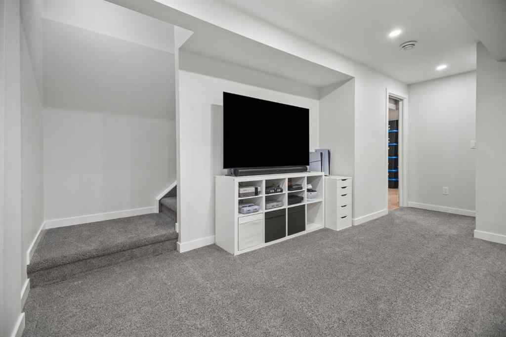 MLS® A2266090 - 411 River Heights Crescent  in River Song Cochrane, Residential