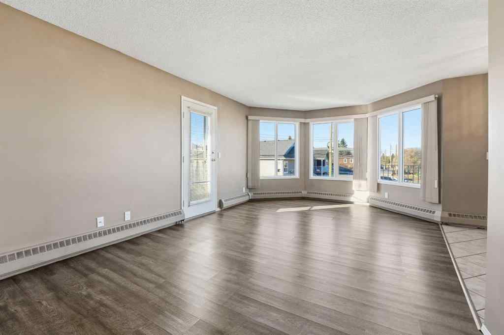 MLS® A2266098 - Unit #208 5135 Lakeshore Drive  in Downtown Sylvan Lake, Residential