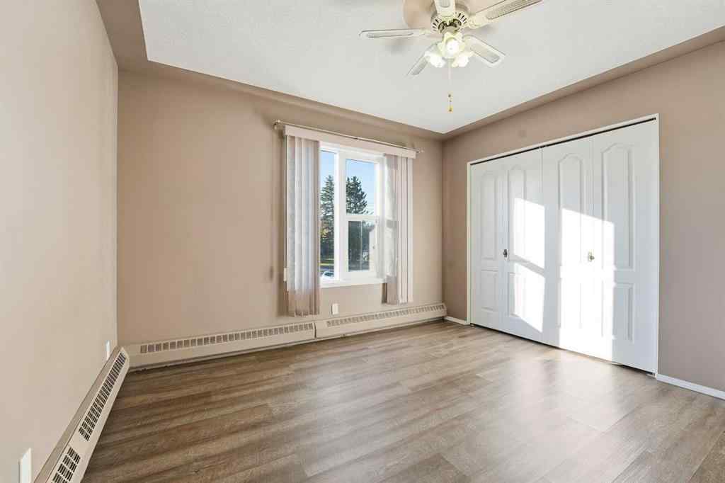 MLS® A2266098 - Unit #208 5135 Lakeshore Drive  in Downtown Sylvan Lake, Residential
