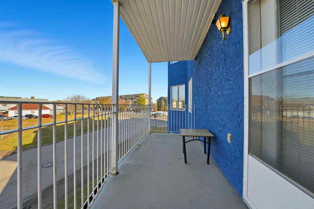 MLS® A2266098 - Unit #208 5135 Lakeshore Drive  in Downtown Sylvan Lake, Residential