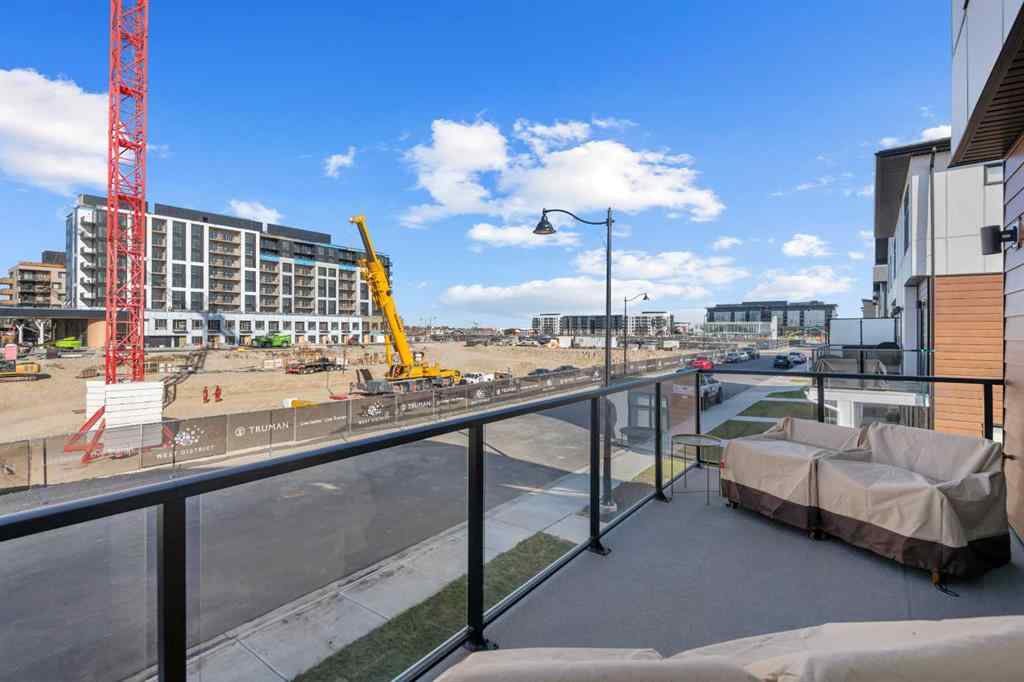 MLS® A2266099 - 8305 8 Avenue SW in West Springs Calgary, Residential