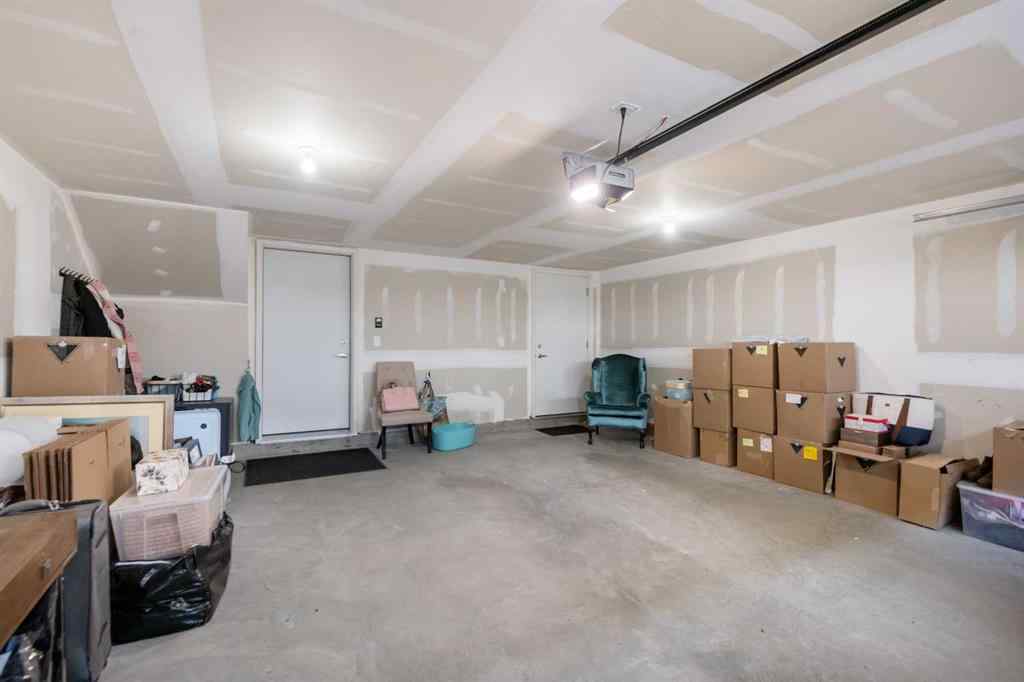 MLS® A2266099 - 8305 8 Avenue SW in West Springs Calgary, Residential