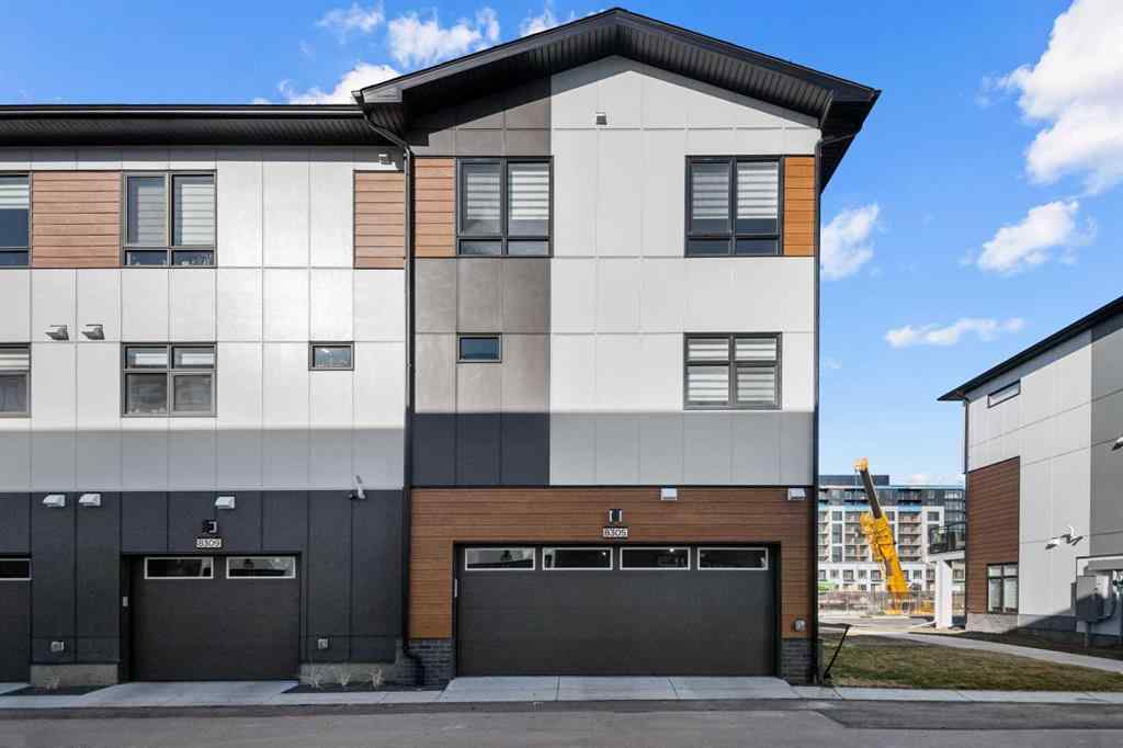 MLS® A2266099 - 8305 8 Avenue SW in West Springs Calgary, Residential