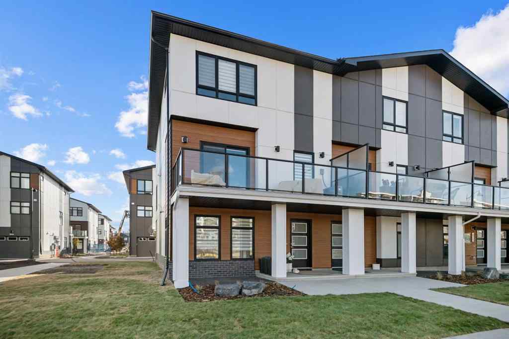 MLS® A2266099 - 8305 8 Avenue SW in West Springs Calgary, Residential