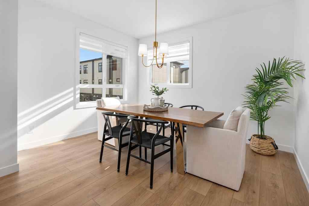 MLS® A2266099 - 8305 8 Avenue SW in West Springs Calgary, Residential