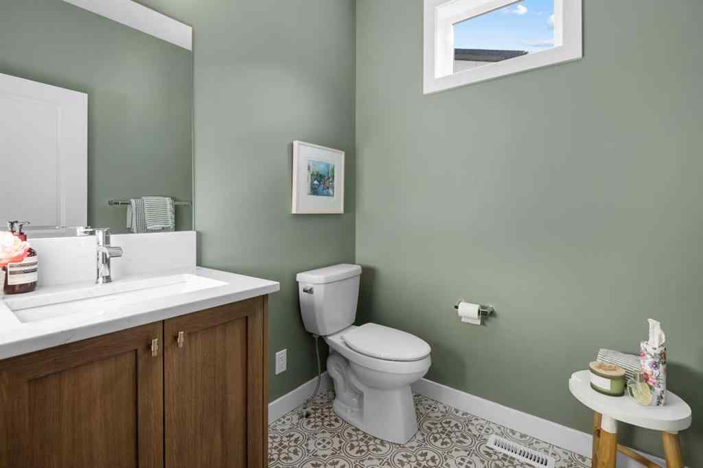 MLS® A2266099 - 8305 8 Avenue SW in West Springs Calgary, Residential