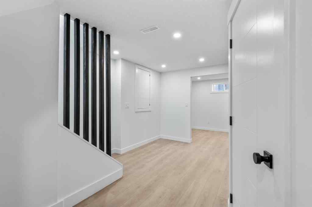 MLS® A2266101 - 124 Gainsborough Drive SW in Glamorgan Calgary, Residential