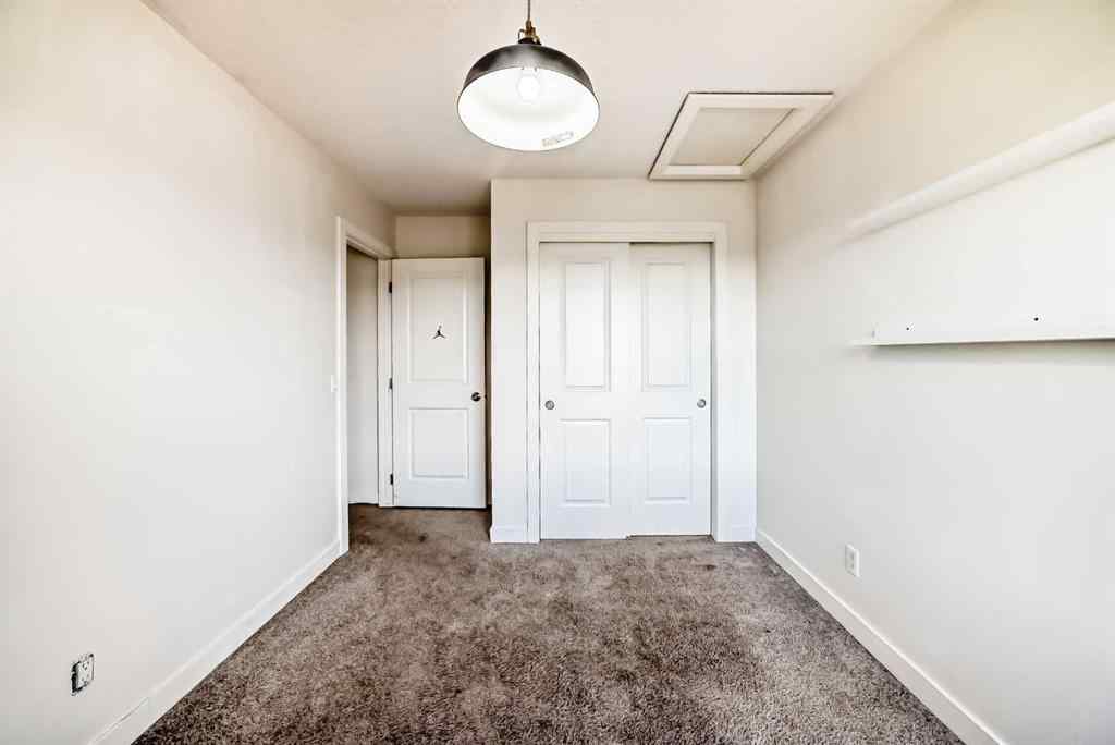 MLS® A2266106 - Unit #129 2802 Kings Heights Gate SE in Ravenswood Airdrie, Residential