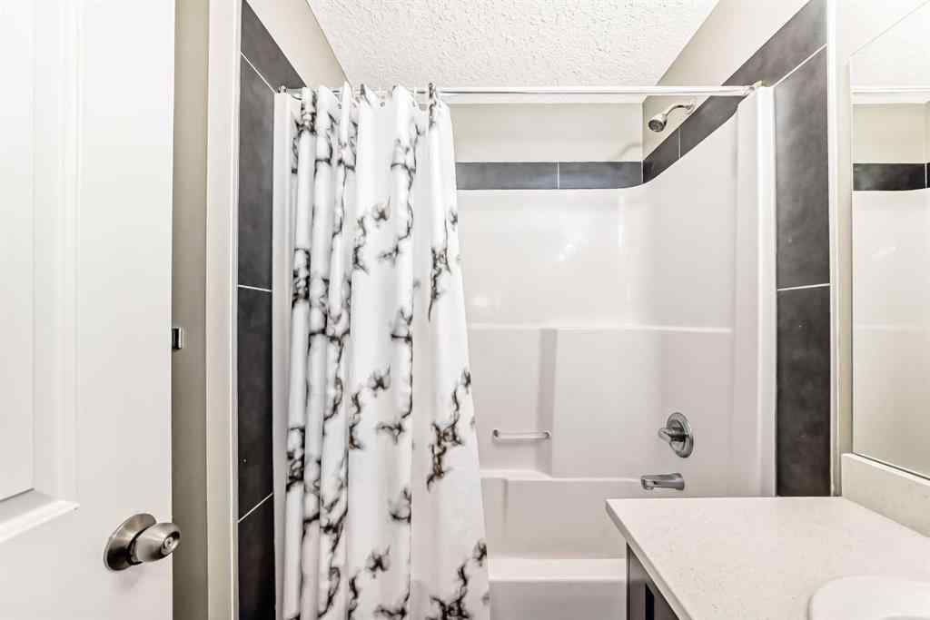 MLS® A2266106 - Unit #129 2802 Kings Heights Gate SE in Ravenswood Airdrie, Residential
