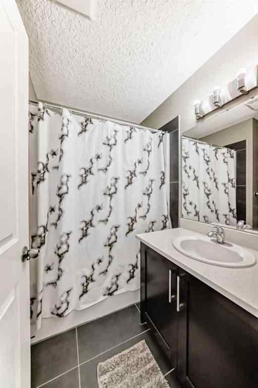 MLS® A2266106 - Unit #129 2802 Kings Heights Gate SE in Ravenswood Airdrie, Residential