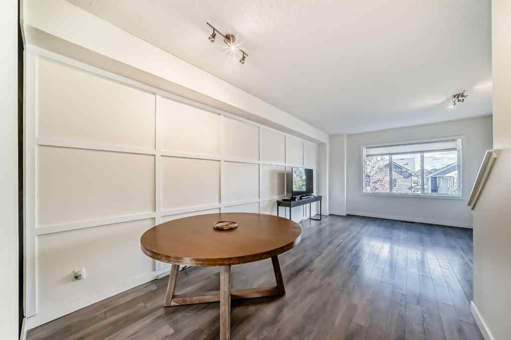 MLS® A2266106 - Unit #129 2802 Kings Heights Gate SE in Ravenswood Airdrie, Residential