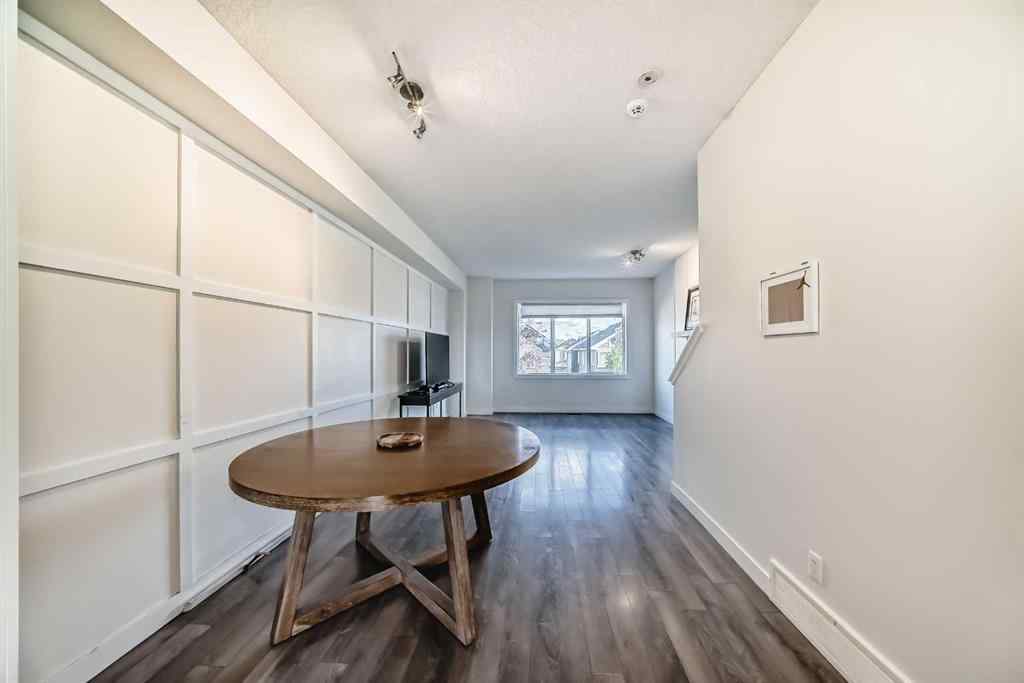 MLS® A2266106 - Unit #129 2802 Kings Heights Gate SE in Ravenswood Airdrie, Residential