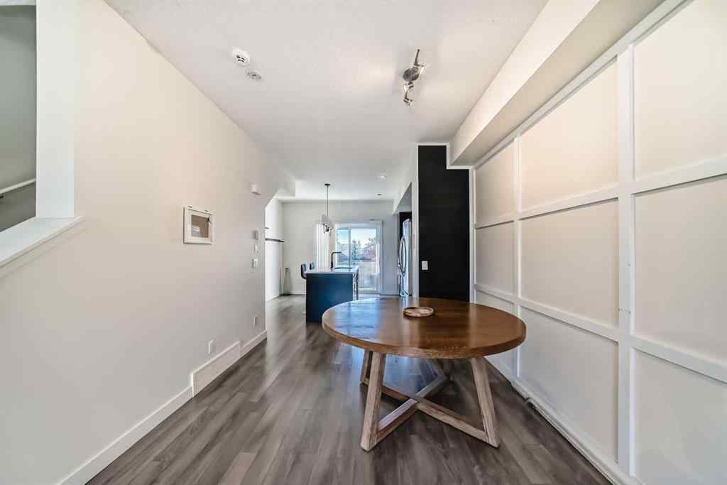 MLS® A2266106 - Unit #129 2802 Kings Heights Gate SE in Ravenswood Airdrie, Residential