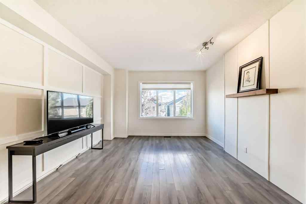 MLS® A2266106 - Unit #129 2802 Kings Heights Gate SE in Ravenswood Airdrie, Residential