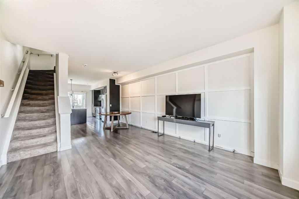 MLS® A2266106 - Unit #129 2802 Kings Heights Gate SE in Ravenswood Airdrie, Residential