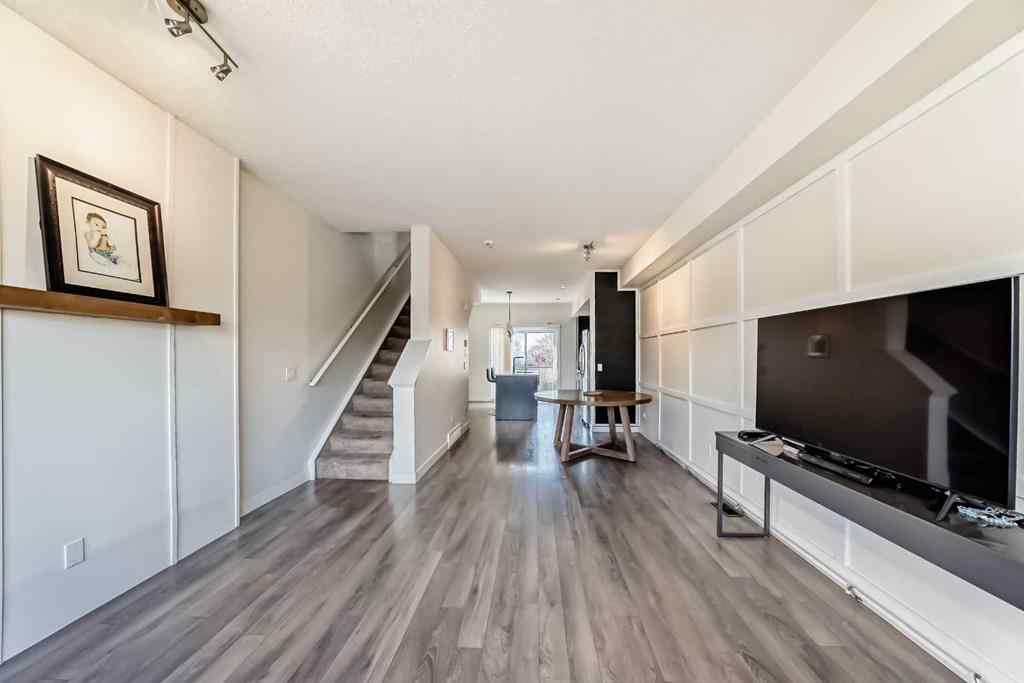 MLS® A2266106 - Unit #129 2802 Kings Heights Gate SE in Ravenswood Airdrie, Residential