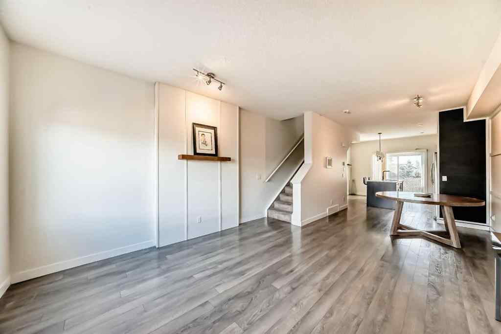 MLS® A2266106 - Unit #129 2802 Kings Heights Gate SE in Ravenswood Airdrie, Residential
