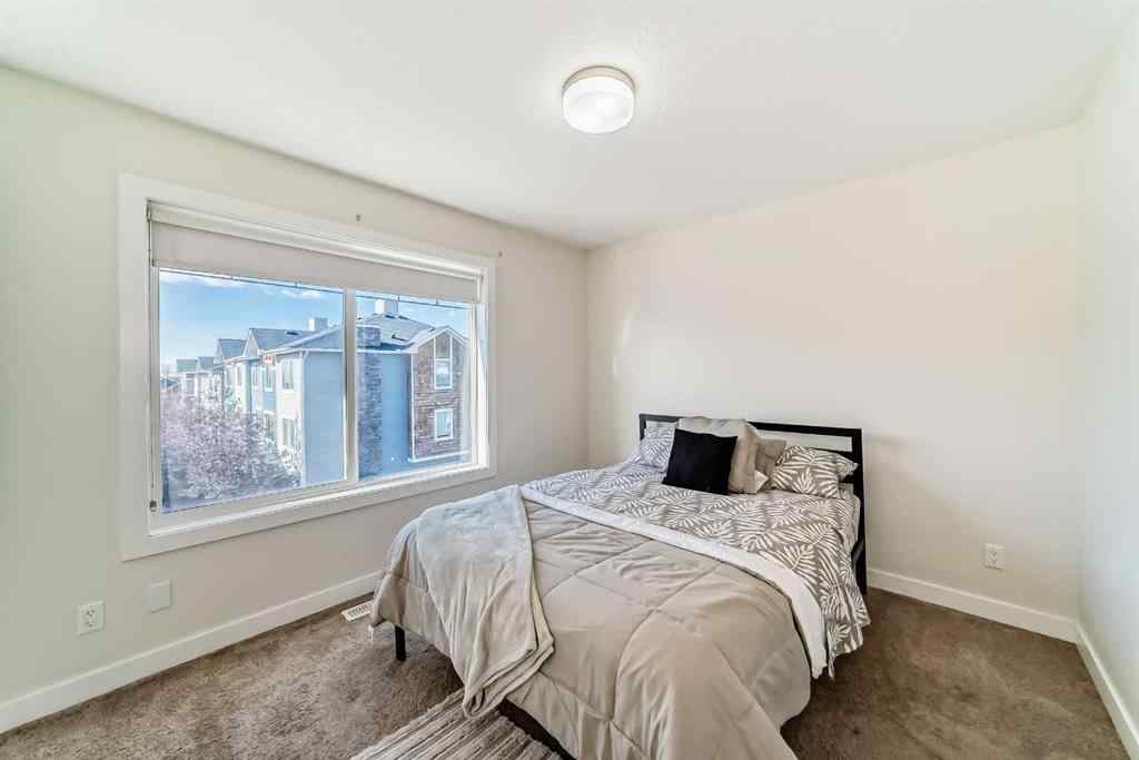 MLS® A2266106 - Unit #129 2802 Kings Heights Gate SE in Ravenswood Airdrie, Residential