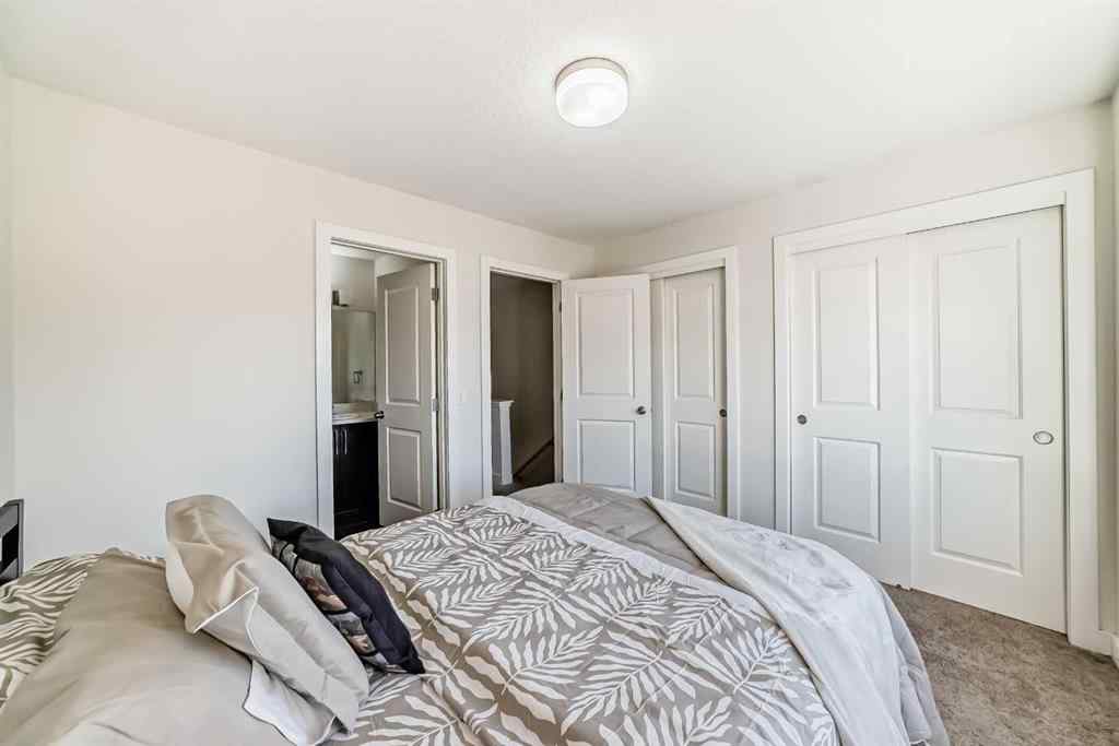 MLS® A2266106 - Unit #129 2802 Kings Heights Gate SE in Ravenswood Airdrie, Residential