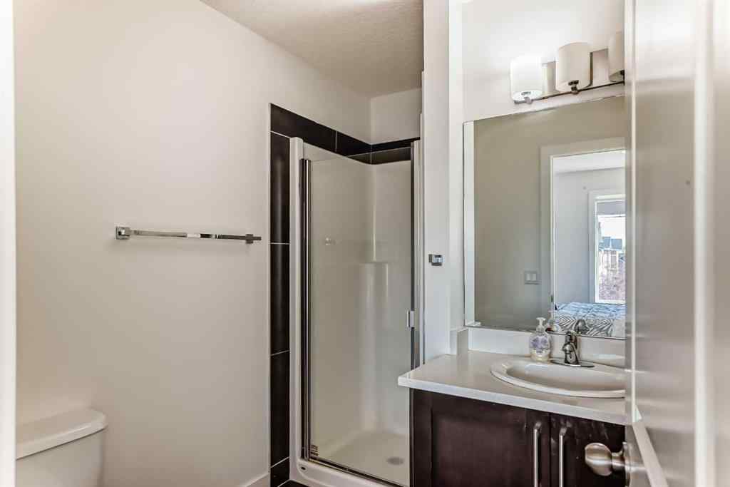MLS® A2266106 - Unit #129 2802 Kings Heights Gate SE in Ravenswood Airdrie, Residential