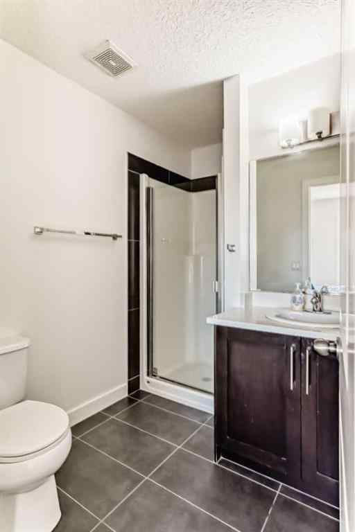 MLS® A2266106 - Unit #129 2802 Kings Heights Gate SE in Ravenswood Airdrie, Residential