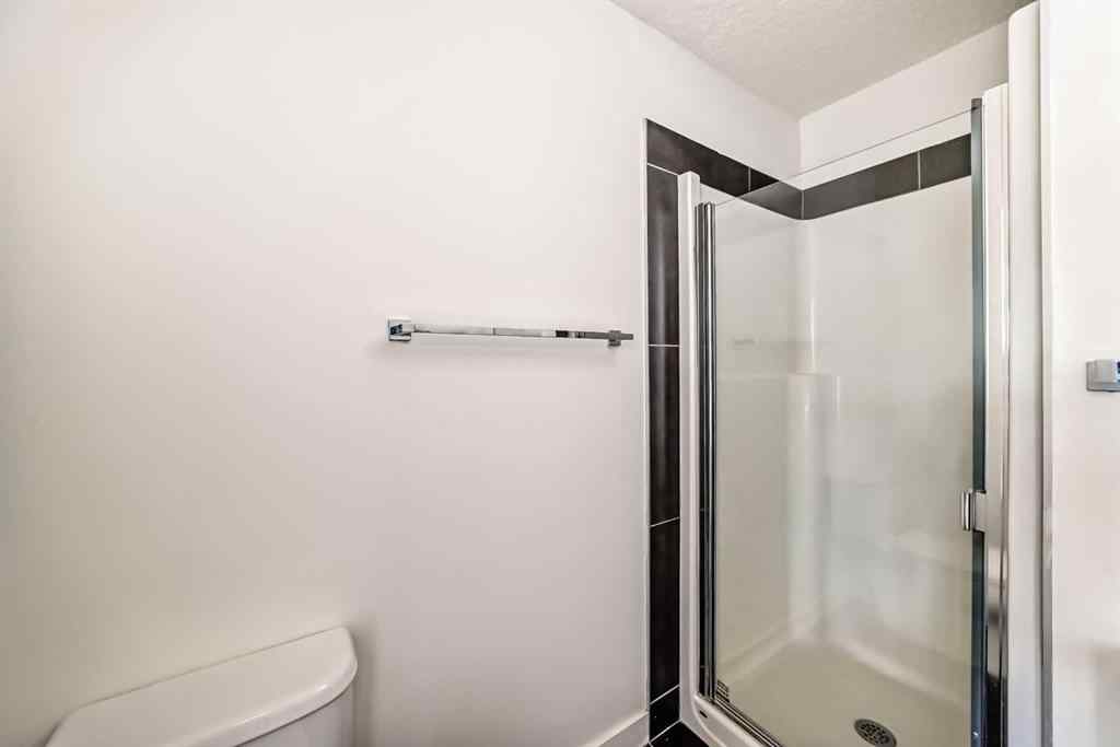 MLS® A2266106 - Unit #129 2802 Kings Heights Gate SE in Ravenswood Airdrie, Residential