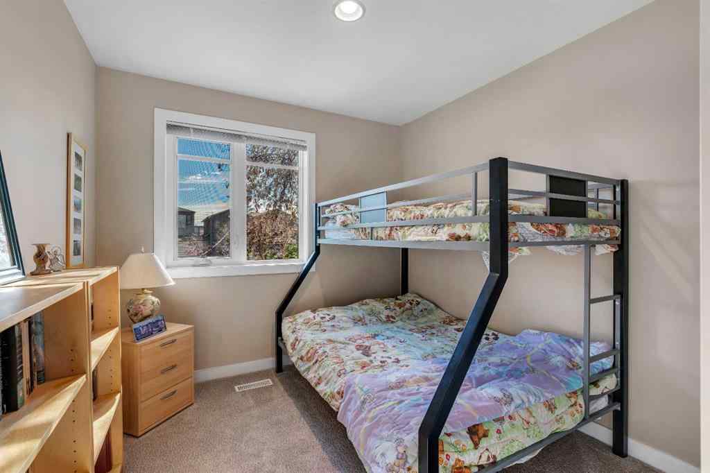 MLS® A2266107 - 2215 2 Avenue NW in West Hillhurst Calgary, Residential