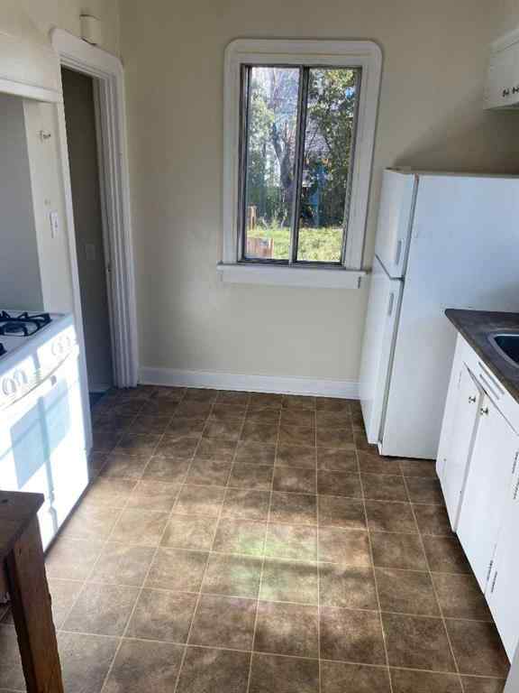 MLS® A2266119 - 1402 Centre A Street NE in Crescent Heights Calgary, Residential