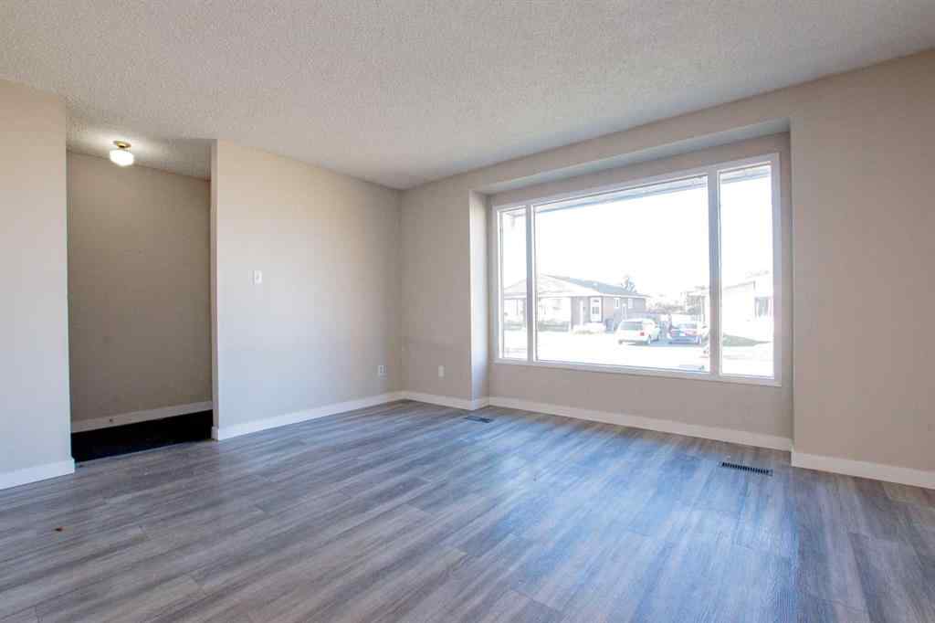 MLS® A2266133 - 8115 94 Street  in Patterson Place Grande Prairie, Residential