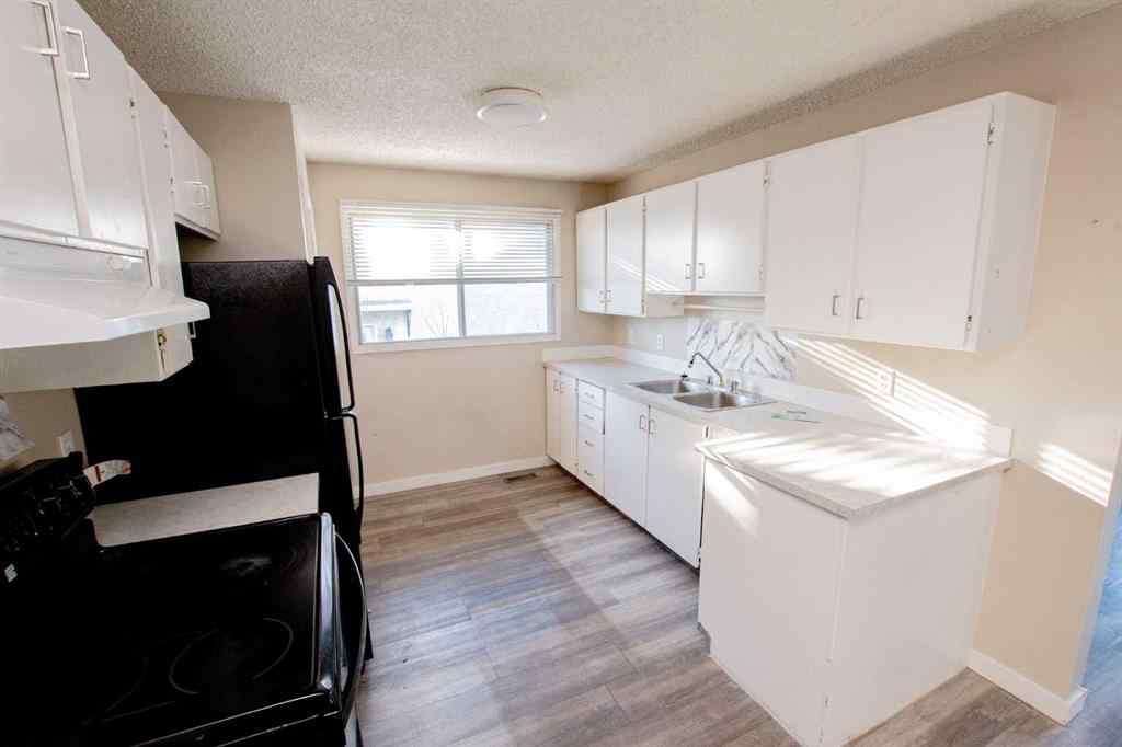 MLS® A2266133 - 8115 94 Street  in Patterson Place Grande Prairie, Residential