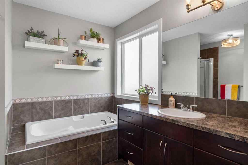 MLS® A2266136 - 2581 Coopers Circle SW in Coopers Crossing Airdrie, Residential