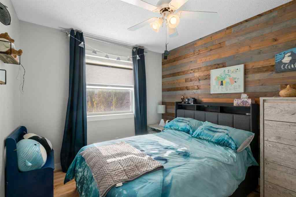 MLS® A2266136 - 2581 Coopers Circle SW in Coopers Crossing Airdrie, Residential