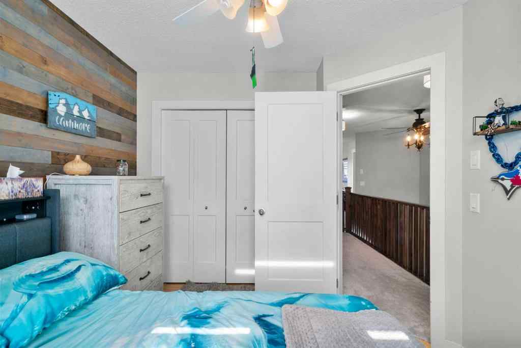 MLS® A2266136 - 2581 Coopers Circle SW in Coopers Crossing Airdrie, Residential