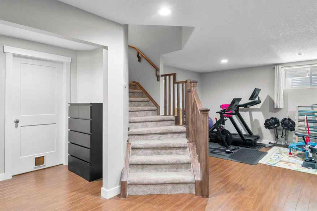 MLS® A2266136 - 2581 Coopers Circle SW in Coopers Crossing Airdrie, Residential