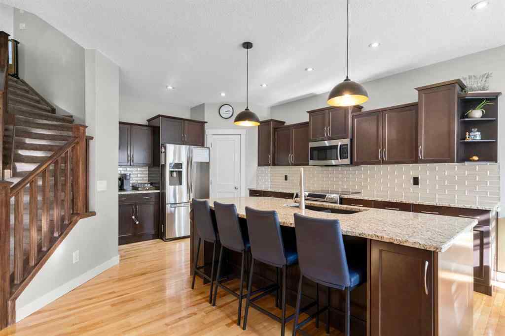 MLS® A2266136 - 2581 Coopers Circle SW in Coopers Crossing Airdrie, Residential