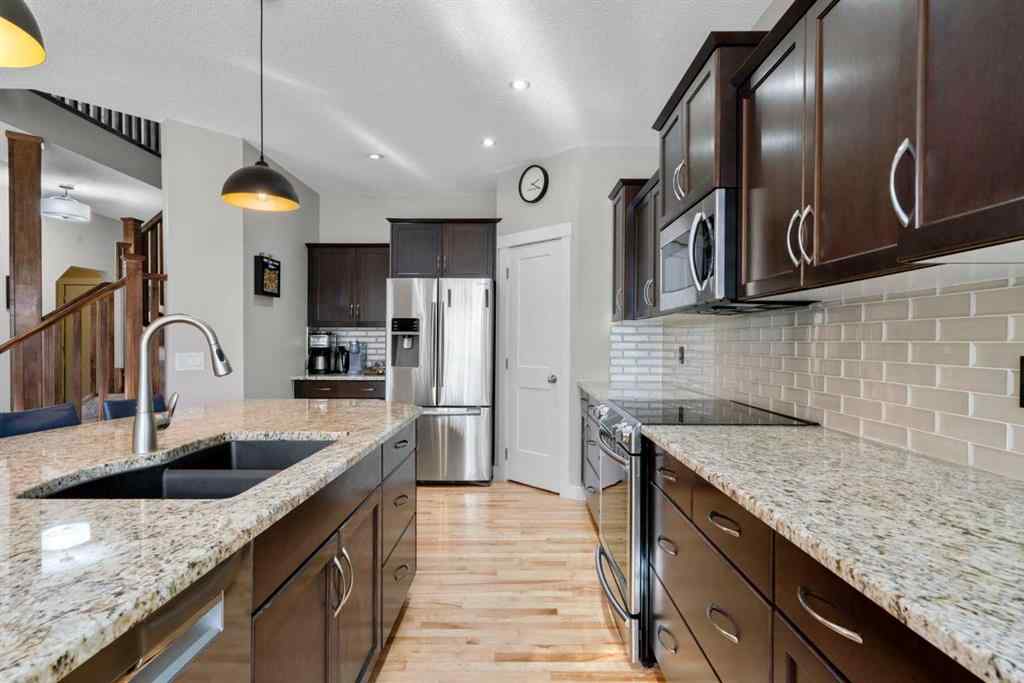 MLS® A2266136 - 2581 Coopers Circle SW in Coopers Crossing Airdrie, Residential