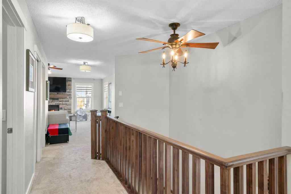 MLS® A2266136 - 2581 Coopers Circle SW in Coopers Crossing Airdrie, Residential