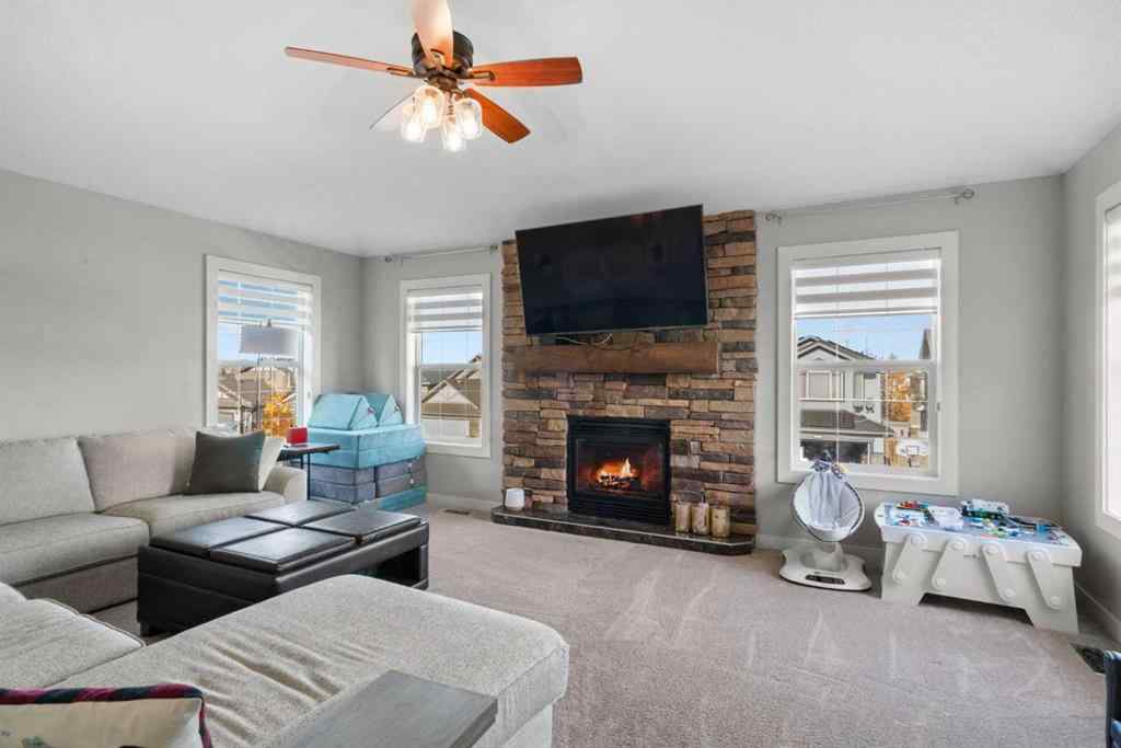 MLS® A2266136 - 2581 Coopers Circle SW in Coopers Crossing Airdrie, Residential