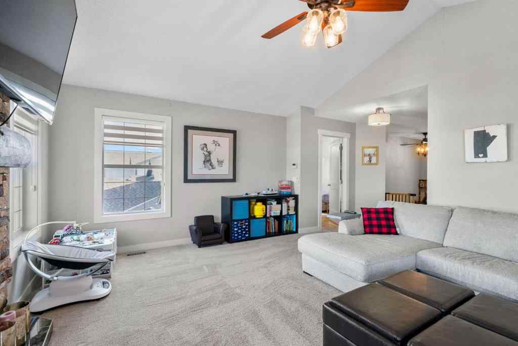 MLS® A2266136 - 2581 Coopers Circle SW in Coopers Crossing Airdrie, Residential